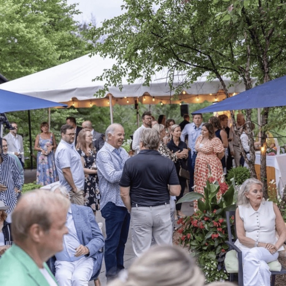 A full restaurant buy-out event at Crossroads, guests gathered under a tent